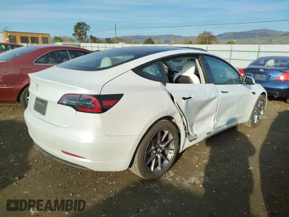 ✅ 2022 Tesla Model 3 • VIN: 5YJ3E1EA8NF236863 • Лот: 70345072. Опубліковано раніше на Copart з пробігом 14 774 миль. Безкоштовний доступ до архіву аукціонних продажів зі США та докладний звіт про історію автомобіля на DreamBid. Зображення 3.