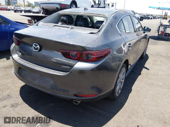 ✅ 2020 Mazda 3 Premium • VIN: JM1BPAEM9L1166750 • Lot: 45402018. Listed on IAAI with 18,222 mi. Free auction sales archive from the USA and detailed vehicle history report at DreamBid. Image 4.
