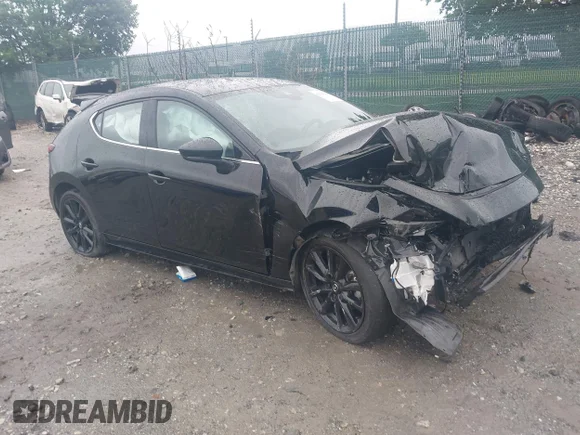 ✅ 2023 Mazda 3 Premium Plus • VIN: JM1BPBNY2P1605592 • Lot: 42325156. Listed on IAAI with 53,756 mi. Free auction sales archive from the USA and detailed vehicle history report at DreamBid. Image 1.