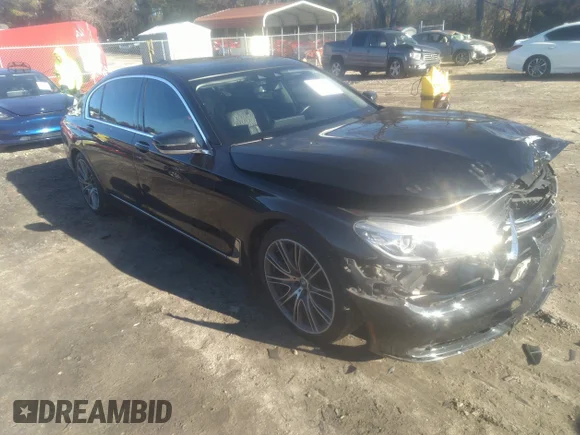 ✅ 2018 BMW 7 Series 740i • VIN: WBA7E2C57JG742257 • Лот: 41353435. Опубликован ранее на IAAI с пробегом 77 125 миль. Бесплатный доступ к архиву аукционных продаж из США и подробный отчёт об истории автомобиля на DreamBid. Изображение 1.