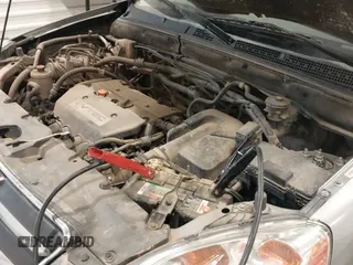 ✅ 2006 Honda CR-V EX • VIN: JHLRD78826C007184 • Лот: 43609069. Опубликован ранее на IAAI с пробегом 300 059 миль. Бесплатный доступ к архиву аукционных продаж из США и подробный отчёт об истории автомобиля на DreamBid. Изображение 13.