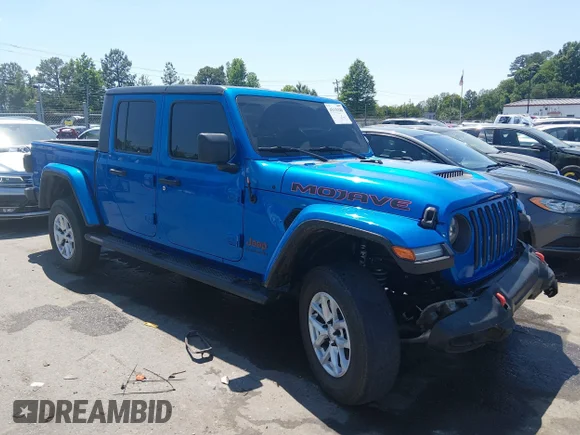 ✅ 2021 Jeep Gladiator Mojave • VIN: 1C6JJTEG7ML551675 • Lot: 45118340. Listed on IAAI with 79,556 mi. Free auction sales archive from the USA and detailed vehicle history report at DreamBid. Image 1.