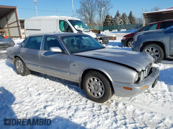 ✅ 2003 Jaguar XJ 8 • VIN: SAJDA14C93LF54265 • Lot: 44263558. Listed on IAAI with 107,675 mi. Free auction sales archive from the USA and detailed vehicle history report at DreamBid. Image 1.