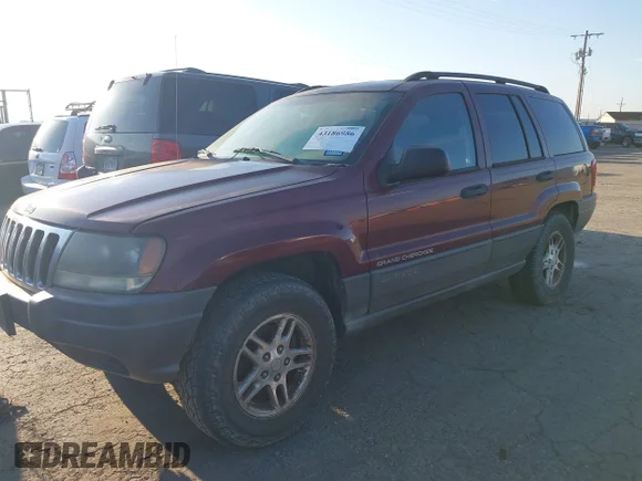 ✅ 2003 Jeep Grand Cherokee Laredo • VIN: 1J4GX48S83C551023 • Лот: 43186986. Опубликован ранее на IAAI с пробегом 176 490 миль. Бесплатный доступ к архиву аукционных продаж из США и подробный отчёт об истории автомобиля на DreamBid. Изображение 2.