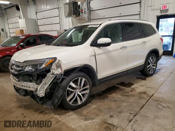 ✅ 2018 Honda Pilot Touring • VIN: 5FNYF6H96JB070077 • Lot: 51467816. Wystawiony na Copart z przebiegiem 124 708 mil. Bezpłatny archiwum sprzedaży aukcyjnych z USA i szczegółowy raport historii pojazdu na DreamBid. Zdjęcie 1.