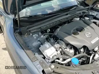 ✅ 2025 Mazda CX-50 Premium • VIN: 7MMVABDY0SN328586 • Лот: 58698845. Опубликован ранее на Copart с пробегом 5 014 миль. Бесплатный доступ к архиву аукционных продаж из США и подробный отчёт об истории автомобиля на DreamBid. Изображение 15.