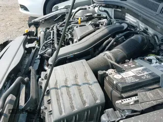 ✅ 2023 Volkswagen Jetta SE • VIN: 3VW7M7BUXPM056379 • Lot: 42907404. Wystawiony na IAAI z przebiegiem 14 107 mil. Bezpłatny archiwum sprzedaży aukcyjnych z USA i szczegółowy raport historii pojazdu na DreamBid. Zdjęcie 19.