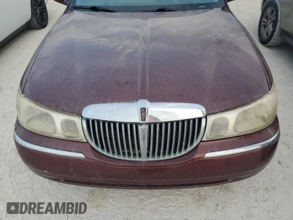 ✅ 2001 Lincoln Town Car Cartier • VIN: 1LNHM83W51Y648034 • Lot: 75482834. Wystawiony na Copart z przebiegiem Nie podano. Bezpłatny archiwum sprzedaży aukcyjnych z USA i szczegółowy raport historii pojazdu na DreamBid. Zdjęcie 11.