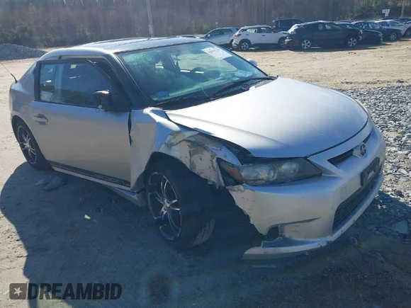 ✅ 2011 Scion tC • VIN: JTKJF5C72B3018308 • Lot: 42015739. Wystawiony na IAAI z przebiegiem 121 642 mil. Bezpłatny archiwum sprzedaży aukcyjnych z USA i szczegółowy raport historii pojazdu na DreamBid. Zdjęcie 1.
