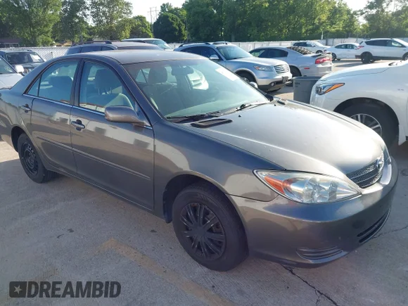 ✅ 2004 Toyota Camry LE • VIN: 4T1BE32K84U924402 • Lot: 45330450. Listed on IAAI with 149,322 mi. Free auction sales archive from the USA and detailed vehicle history report at DreamBid. Image 1.