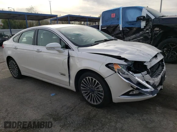 ✅ 2018 Ford Fusion Titanium • VIN: 3FA6P0SU2JR123571 • Lot: 36190323. Wystawiony na Copart z przebiegiem 643 399 mil. Bezpłatny archiwum sprzedaży aukcyjnych z USA i szczegółowy raport historii pojazdu na DreamBid. Zdjęcie 4.