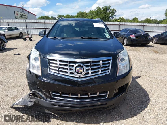 ✅ 2015 Cadillac SRX Luxury Collection • VIN: 3GYFNBE32FS568076 • Lot: 45194148. Wystawiony na IAAI z przebiegiem 135 102 mil. Bezpłatny archiwum sprzedaży aukcyjnych z USA i szczegółowy raport historii pojazdu na DreamBid. Zdjęcie 12.