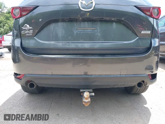 ✅ 2018 Mazda CX-5 Touring • VIN: JM3KFBCM2J0387080 • Lot: 45142370. Wystawiony na IAAI z przebiegiem 123 515 mil. Bezpłatny archiwum sprzedaży aukcyjnych z USA i szczegółowy raport historii pojazdu na DreamBid. Zdjęcie 6.