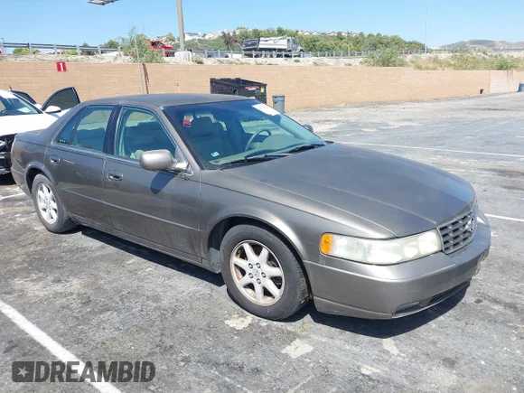 ✅ 2002 Cadillac Seville Luxury SLS • VIN: 1G6KS54Y22U269423 • Лот: 44898128. Опубликован ранее на IAAI с пробегом 205 803 миль. Бесплатный доступ к архиву аукционных продаж из США и подробный отчёт об истории автомобиля на DreamBid. Изображение 1.