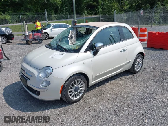 ✅ 2013 FIAT 500 Lounge • VIN: 3C3CFFER0DT648893 • Lot: 42399548. Wystawiony na IAAI z przebiegiem 74 692 mil. Bezpłatny archiwum sprzedaży aukcyjnych z USA i szczegółowy raport historii pojazdu na DreamBid. Zdjęcie 2.