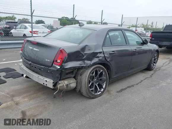 ✅ 2015 Chrysler 300 S • VIN: 2C3CCABG3FH786874 • Lot: 45323778. Listed on IAAI with 118,036 mi. Free auction sales archive from the USA and detailed vehicle history report at DreamBid. Image 4.