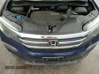 ✅ 2018 Honda Pilot EX • VIN: 5FNYF5H39JB031666 • Лот: 68173685. Опубликован ранее на Copart с пробегом 127 404 миль. Бесплатный доступ к архиву аукционных продаж из США и подробный отчёт об истории автомобиля на DreamBid. Изображение 14.