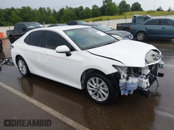 ✅ 2023 Toyota Camry LE • VIN: 4T1C11AK3PU185417 • Лот: 45208868. Опубліковано раніше на IAAI з пробігом 37 471 миль. Безкоштовний доступ до архіву аукціонних продажів зі США та докладний звіт про історію автомобіля на DreamBid. Зображення 1.