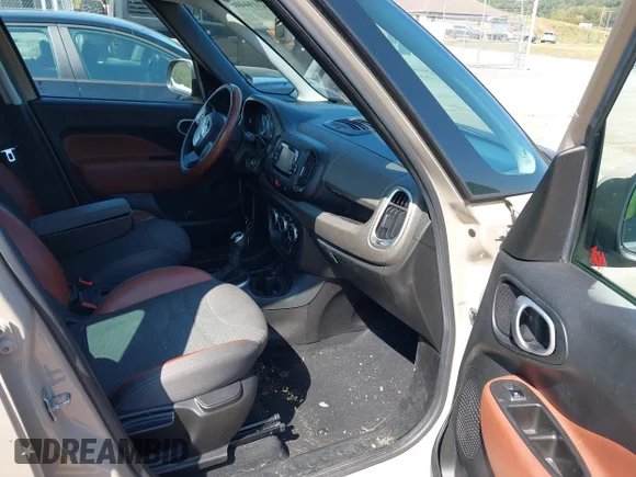 ✅ 2015 FIAT 500L Urbana Trekking • VIN: ZFBCFADH9FZ033832 • Лот: 43194406. Опубликован ранее на IAAI с пробегом 99 868 миль. Бесплатный доступ к архиву аукционных продаж из США и подробный отчёт об истории автомобиля на DreamBid. Изображение 5.
