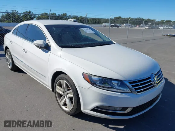 ✅ 2013 Volkswagen CC R-Line • VIN: WVWBN7AN1DE555528 • Лот: 43704816. Опубликован ранее на IAAI с пробегом 170 988 миль. Бесплатный доступ к архиву аукционных продаж из США и подробный отчёт об истории автомобиля на DreamBid. Изображение 1.
