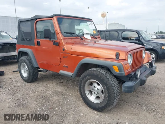 ✅ 2002 Jeep Wrangler Sport • VIN: 1J4FA49S92P744901 • Лот: 44978118. Опубліковано раніше на IAAI з пробігом 93 959 миль. Безкоштовний доступ до архіву аукціонних продажів зі США та докладний звіт про історію автомобіля на DreamBid. Зображення 1.