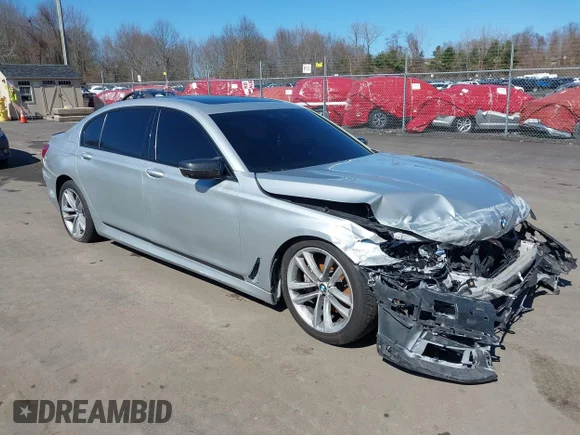 ✅ 2017 BMW 7 Series 740i xDrive • VIN: WBA7E4C35HGU99939 • Lot: 44689722. Listed on IAAI with 123,665 mi. Free auction sales archive from the USA and detailed vehicle history report at DreamBid. Image 1.