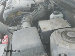 ✅ 2003 Kia Spectra • VIN: KNAFB121535246949 • Lot: 42402307. Listed on IAAI with 98,678 mi. Free auction sales archive from the USA and detailed vehicle history report at DreamBid. Image 12.