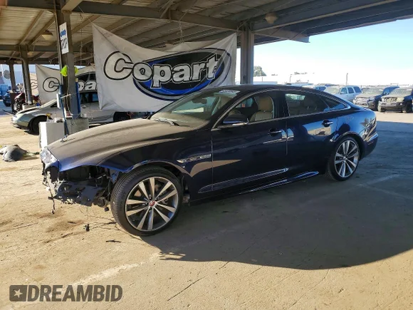 ✅ 2018 Jaguar XJ R-Sport • VIN: SAJWA1C72J8W17409 • Lot: 46430846. Listed on Copart with 92,496 mi. Free auction sales archive from the USA and detailed vehicle history report at DreamBid. Image 1.