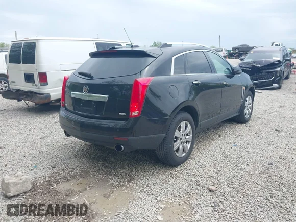 ✅ 2015 Cadillac SRX Luxury Collection • VIN: 3GYFNBE34FS624714 • Lot: 42232644. Wystawiony na IAAI z przebiegiem 173 512 mil. Bezpłatny archiwum sprzedaży aukcyjnych z USA i szczegółowy raport historii pojazdu na DreamBid. Zdjęcie 4.