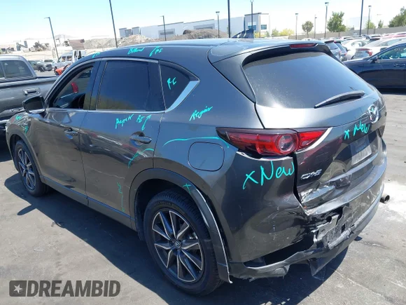 ✅ 2018 Mazda CX-5 Grand Touring • VIN: JM3KFADMXJ0369046 • Лот: 45467119. Опубліковано раніше на IAAI з пробігом 157 214 миль. Безкоштовний доступ до архіву аукціонних продажів зі США та докладний звіт про історію автомобіля на DreamBid. Зображення 3.