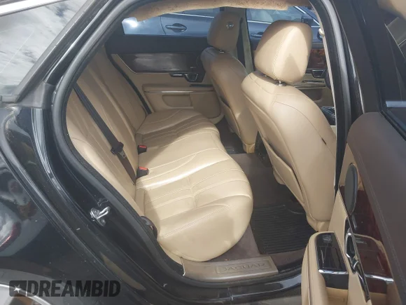 ✅ 2014 Jaguar XJ • VIN: SAJWA1CZ0E8V61851 • Lot: 42948900. Wystawiony na IAAI z przebiegiem 115 369 mil. Bezpłatny archiwum sprzedaży aukcyjnych z USA i szczegółowy raport historii pojazdu na DreamBid. Zdjęcie 8.