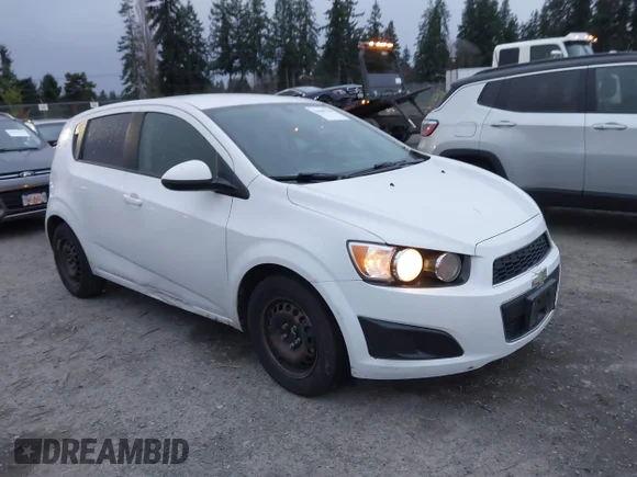 ✅ 2014 Chevrolet Sonic LS • VIN: 1G1JA6SH2E4200569 • Lot: 44009700. Listed on IAAI with 165,435 mi. Free auction sales archive from the USA and detailed vehicle history report at DreamBid. Image 1.