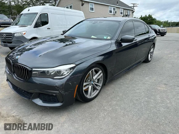 ✅ 2019 BMW 7 Series 740i xDrive • VIN: WBA7E4C55KGV28722 • Лот: 64955445. Опубликован ранее на Copart с пробегом 94 901 миль. Бесплатный доступ к архиву аукционных продаж из США и подробный отчёт об истории автомобиля на DreamBid. Изображение 1.