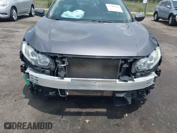 ✅ 2018 Honda Civic EX • VIN: 19XFC2F72JE031826 • Лот: 45190506. Опубліковано раніше на IAAI з пробігом 67 681 миль. Безкоштовний доступ до архіву аукціонних продажів зі США та докладний звіт про історію автомобіля на DreamBid. Зображення 6.