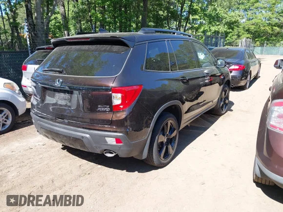 ✅ 2021 Honda Passport Elite • VIN: 5FNYF8H03MB026880 • Lot: 42181712. Wystawiony na IAAI z przebiegiem 36 510 mil. Bezpłatny archiwum sprzedaży aukcyjnych z USA i szczegółowy raport historii pojazdu na DreamBid. Zdjęcie 4.