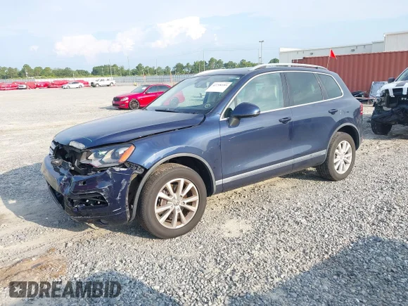 ✅ 2013 Volkswagen Touareg Sport • VIN: WVGEF9BP7DD001241 • Lot: 42798189. Wystawiony na IAAI z przebiegiem 129 582 mil. Bezpłatny archiwum sprzedaży aukcyjnych z USA i szczegółowy raport historii pojazdu na DreamBid. Zdjęcie 2.
