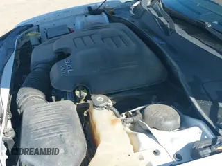 ✅ 2013 Chrysler 300 S • VIN: 2C3CCAGG5DH599657 • Lot: 42745453. Listed on IAAI with 211,351 mi. Free auction sales archive from the USA and detailed vehicle history report at DreamBid. Image 20.