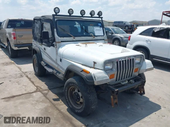 ✅ 1992 Jeep Wrangler • VIN: 2J4FY29S3NJ536580 • Lot: 43028963. Listed on IAAI with 322,878 mi. Free auction sales archive from the USA and detailed vehicle history report at DreamBid. Image 1.