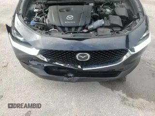 ✅ 2022 Mazda CX-30 S Premium • VIN: 3MVDMBDL4NM434429 • Лот: 72082915. Опубликован ранее на Copart с пробегом 41 606 миль. Бесплатный доступ к архиву аукционных продаж из США и подробный отчёт об истории автомобиля на DreamBid. Изображение 16.
