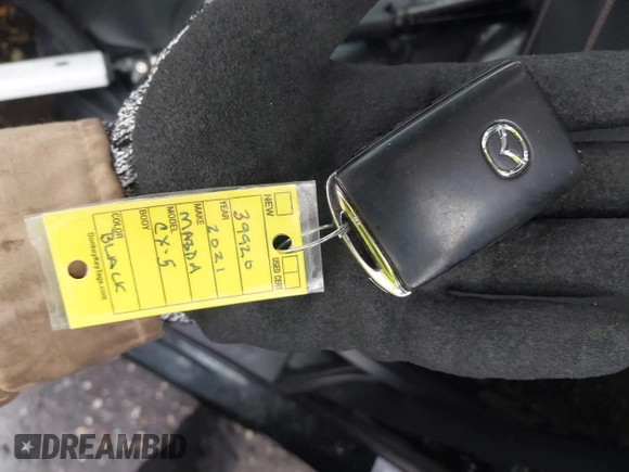 ✅ 2021 Mazda CX-5 Grand Touring • VIN: JM3KFADM3M1388598 • Lot: 44123879. Wystawiony na IAAI z przebiegiem 143 704 mil. Bezpłatny archiwum sprzedaży aukcyjnych z USA i szczegółowy raport historii pojazdu na DreamBid. Zdjęcie 11.