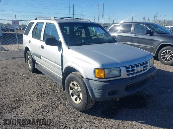 ✅ 1999 Isuzu Rodeo S • VIN: 4S2CK58W1X4337460 • Lot: 44168338. Wystawiony na IAAI z przebiegiem 123 979 mil. Bezpłatny archiwum sprzedaży aukcyjnych z USA i szczegółowy raport historii pojazdu na DreamBid. Zdjęcie 1.