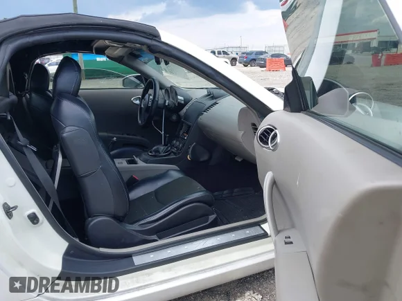 ✅ 2005 Nissan 350Z Touring • VIN: JN1AZ36A25M754595 • Lot: 43297131. Wystawiony na IAAI z przebiegiem 183 628 mil. Bezpłatny archiwum sprzedaży aukcyjnych z USA i szczegółowy raport historii pojazdu na DreamBid. Zdjęcie 5.