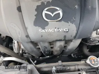 ✅ 2022 Mazda 3 S • VIN: 3MZBPAAL7NM304933 • Lot: 60727995. Listed on Copart with 27,642 mi. Free auction sales archive from the USA and detailed vehicle history report at DreamBid. Image 13.