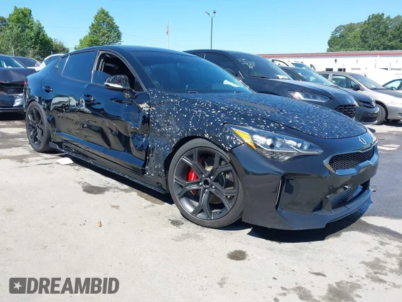 ✅ 2020 Kia Stinger GT • VIN: KNAE35LC2L6081887 • Lot: 45243306. Listed on IAAI with 76,754 mi. Free auction sales archive from the USA and detailed vehicle history report at DreamBid. Image 1.