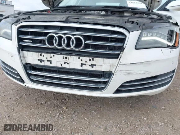 ✅ 2014 Audi A8 3.0T • VIN: WAURGAFD1EN003371 • Лот: 44553554. Опубліковано раніше на IAAI з пробігом 194 490 миль. Безкоштовний доступ до архіву аукціонних продажів зі США та докладний звіт про історію автомобіля на DreamBid. Зображення 6.