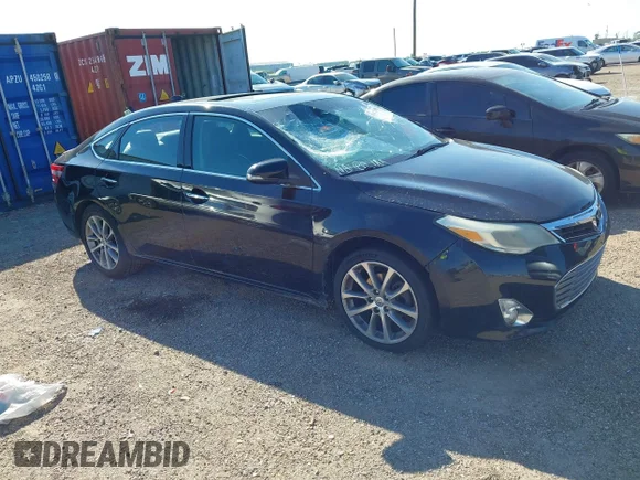 ✅ 2015 Toyota Avalon Limited • VIN: 4T1BK1EB2FU160199 • Lot: 43312188. Listed on IAAI with 152,195 mi. Free auction sales archive from the USA and detailed vehicle history report at DreamBid. Image 1.