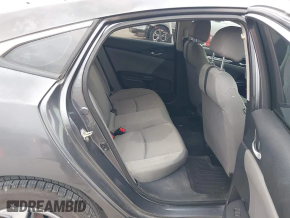 ✅ 2020 Honda Civic LX • VIN: 2HGFC2F61LH552519 • Лот: 45189685. Опубліковано раніше на IAAI з пробігом 128 162 миль. Безкоштовний доступ до архіву аукціонних продажів зі США та докладний звіт про історію автомобіля на DreamBid. Зображення 8.