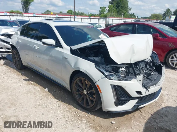 ✅ 2023 Cadillac CT5-V • VIN: 1G6DR5RW7P0120242 • Lot: 42221568. Listed on IAAI with 49,994 mi. Free auction sales archive from the USA and detailed vehicle history report at DreamBid. Image 1.
