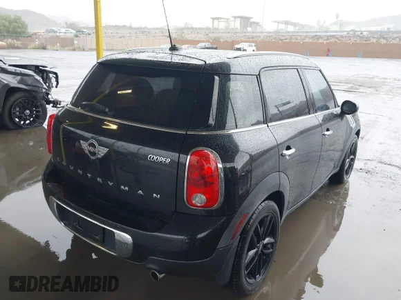 ✅ 2014 MINI Countryman • VIN: WMWZB3C51EWR36608 • Lot: 44002735. Listed on IAAI with 122,361 mi. Free auction sales archive from the USA and detailed vehicle history report at DreamBid. Image 4.