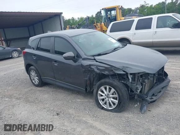 ✅ 2016 Mazda CX-5 Touring • VIN: JM3KE4CY4G0782968 • Lot: 44932323. Listed on IAAI with 128,196 mi. Free auction sales archive from the USA and detailed vehicle history report at DreamBid. Image 1.